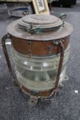 A copper ship's lamp