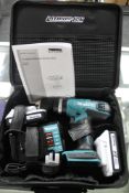 A Makita Lithium ion cordless hammer driver drill,