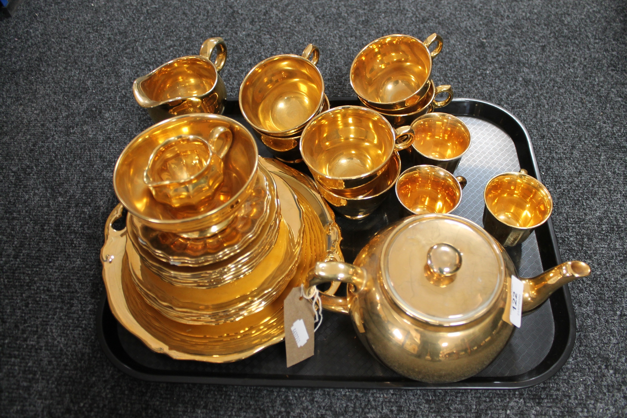 A tray of Royal Winton gilded tea china