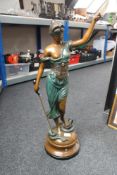 A large patinated metal figure - 'Justice', holding a sword and scales , height 79 cm.