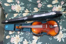 A violin and bow in case