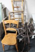 An antique wooden bench together with two chairs, stick stand and chair (for restoration).