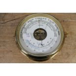 A brass barometer