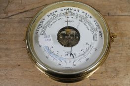 A brass barometer