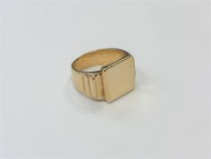A gent's heavy yellow metal signet ring, indistinct foreign marks, stamped 585,