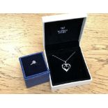 A Warren James silver heart pendant on chain in box,