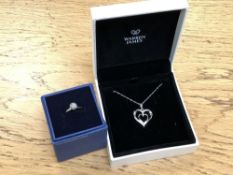 A Warren James silver heart pendant on chain in box,