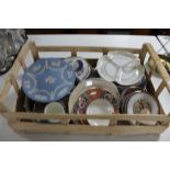 A crate of china plates,