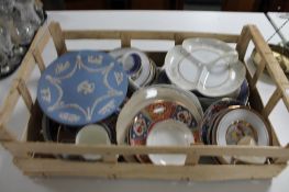 A crate of china plates,