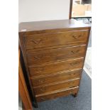 A mid century stained beech six drawer chest