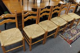 A set of six pine kitchen chairs