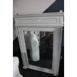 A painted antique style bevelled mirror