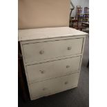 An Edwardian pine painted three drawer chest