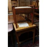 A mid century sewing machine table together with a piano stool