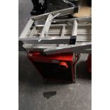 A folding aluminium step ladder and electric heater