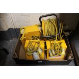 A box of three transformer units and electrical cable