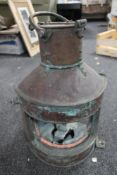 A copper ship's lamp