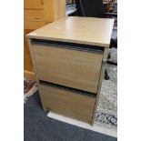 A light oak two drawer filing chest