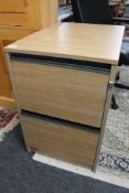 A light oak two drawer filing chest