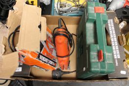 A box of two Black and Decker saws,