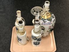 Three Royal Copenhagen porcelain table lamps and an oriental table lamp (continental wiring)