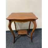 An Edwardian two tier occasional table together with a beech washstand