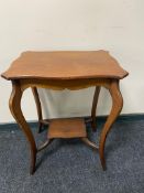 An Edwardian two tier occasional table together with a beech washstand