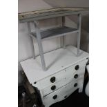 A painted white Edwardian three drawer chest,
