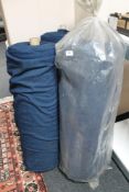 Three large rolls of material