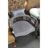 An Edwardian mahogany salon chair
