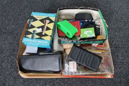 A tray of stationary items, calculator ruler,