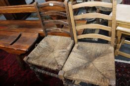 A pair of nineteenth century ladder backed chairs
