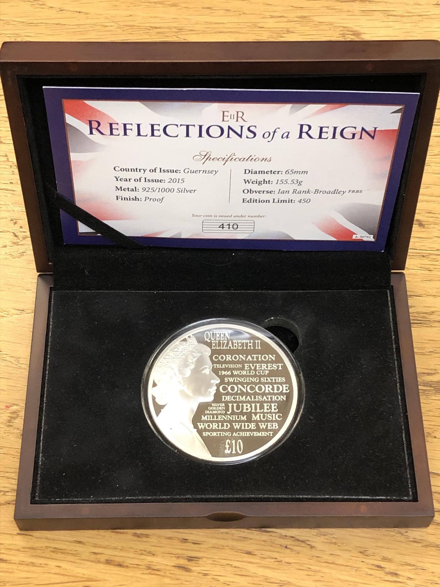 A large silver coin; Queen Elizabeth II, Reflections of a Reign, a limited edition of 410/450,