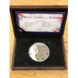 A large silver coin; Queen Elizabeth II, Reflections of a Reign, a limited edition of 410/450,