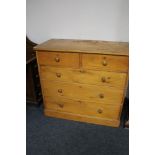 A Victorian pine five drawer chest, height 98 cm, width 167 cm, depth 55.5 cm.