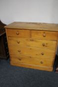 A Victorian pine five drawer chest, height 98 cm, width 167 cm, depth 55.5 cm.