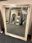 A traditional style cream framed mirror 117 cm x 90 cm