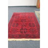 An Afghan Bokhara carpet 230 cm x 162 cm