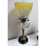 A Victorian glass oil lamp, height 54 cm.