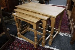 A nest of light oak tables