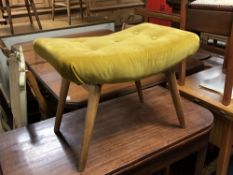 A 20th century teak stool with mustard velvet upholstery