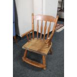 A small child's pine chair