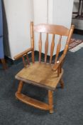 A small child's pine chair