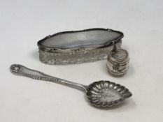 A silver and cut glass pot,