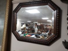 An Edwardian oak mirror