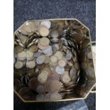 A tin of coins, copper,