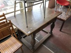 An early 20th century table fitted with a drawer.