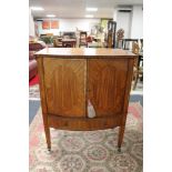 An inlaid mahogany double door TV cabinet