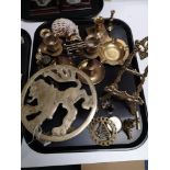A tray of brass, trivet stand,