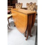 A Nathan teak drop leaf table